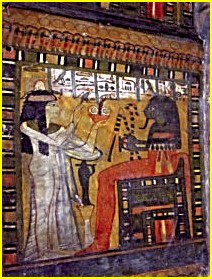 Tanetchedmout fait une offrande  AMSET, un des fils d'HORUS.